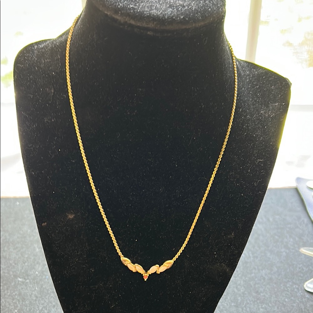 Gold Tone Necklace.